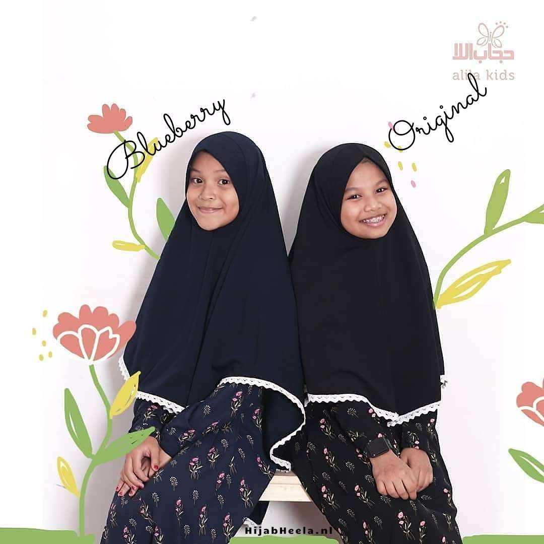 a woman and a man pose for a picture