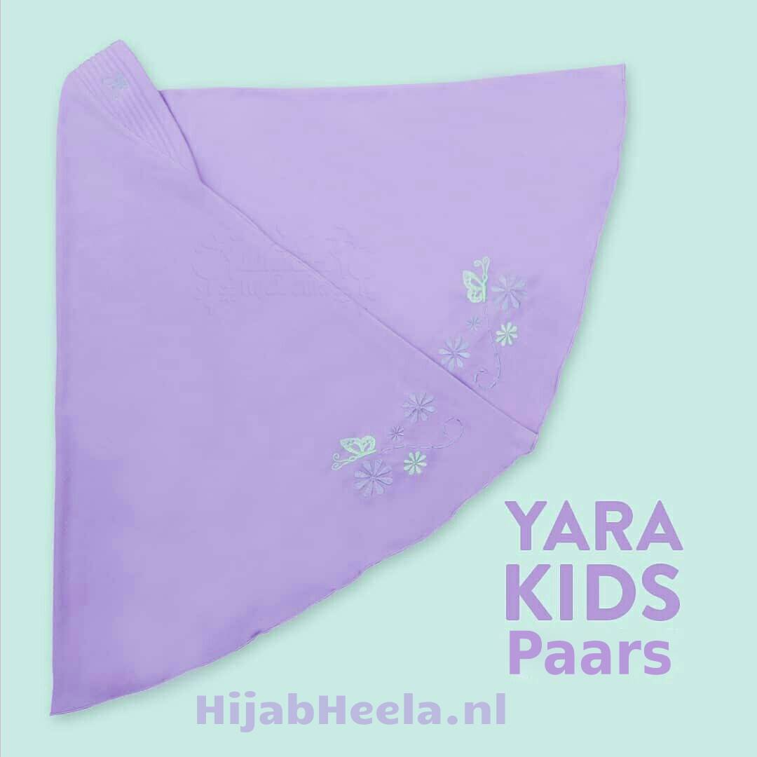 a pink rose is sitting on a pink piece of paper